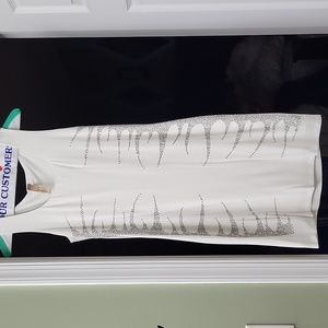 Sexy dress with silver Sparkles on both sides.  Never been worn.